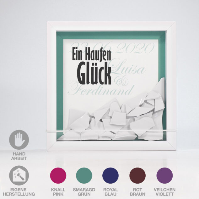 Geschenk für Polterabend oder Hochzeit: Rahmen " Ein Haufen Glück Nr. 2". Das Datum und die Vornamen werden individuell eingedruckt. Man kann zwischen knallpink, smaragdgrün, royalblau, rotbraun, und veilchenviolett auswählen. Hier ist knallpink abgebildet.
