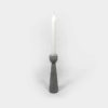 schlichter, hellgrauer Kerzenhalter aus Zement