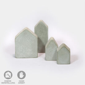 Unsere Beton-Deko Set "Little City" besteht aus vier unterschiedlich großen, von Hand gegossenen Häusern.