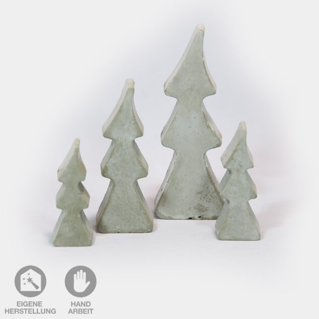Diese vier dekorativen, handgefertigten Beton-Bäume "Oh Tannenbaum" schmücken jede Tischdekoration und jedes Sideboard.