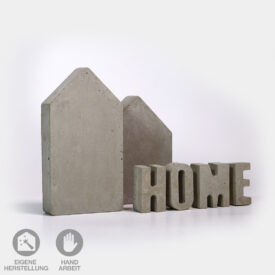 2 Deko-Häuser aus Beton mit dem Wort "HOME" aus Beton-Buchstaben
