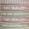 Wunderschönes Stoff-Band mit Beschriftung und Mustern. Beispielsweise 