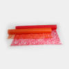 Stoff-Tischläufer aus Vliesband halbtransparent in rot oder orange. Schöner dekorativer Deko-Stoff zur Tischdekoration.