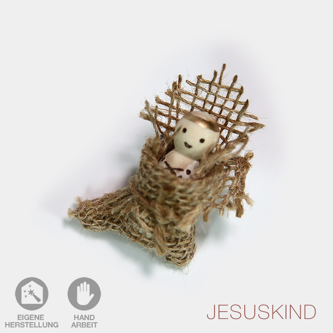 Von Hand bemaltes Jesuskind. Krippenfigur