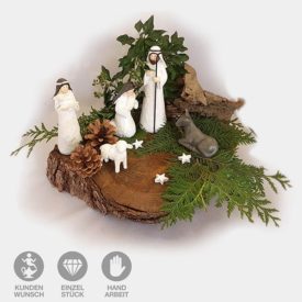 handgeschnitzte Krippen-Figuren auf Holzscheibe